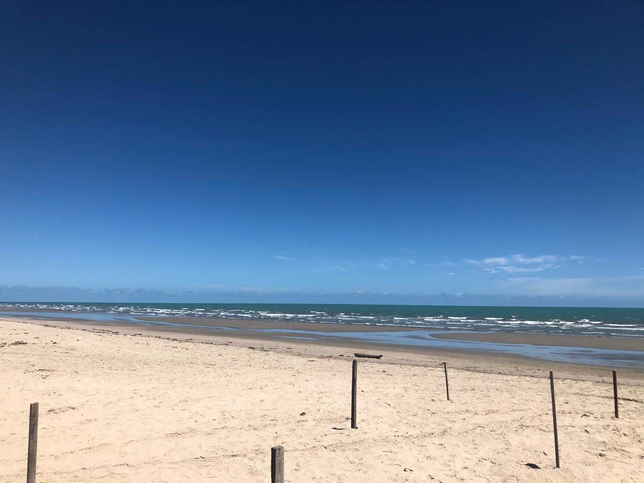 提鲍海滩的照片 带有米色沙子表面