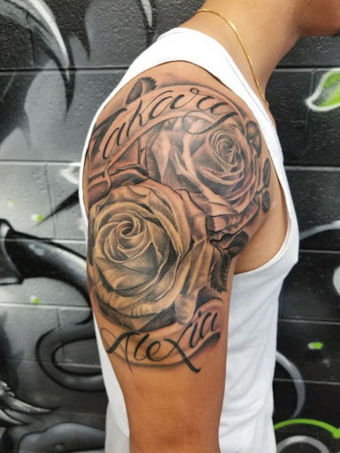 Explore tattoo ideas for men's shoulders, creative tattoo ideas in Burlington, available at Mr Tattoos & Piercing