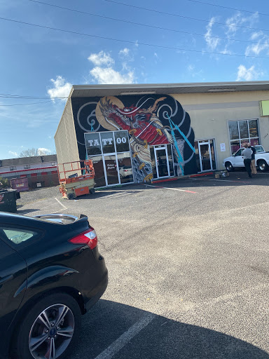 Explore minimalist cat tattoo ideas, creative tattoo ideas in Goose Creek, available at Red Kirin Tattoo