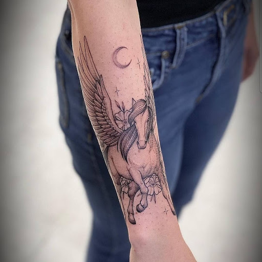 Explore amor fati tattoo ideas, creative tattoo ideas in Rehoboth Beach, available at Tattoo Galaxy (Rehoboth Beach) Piercing & Custom tattoos