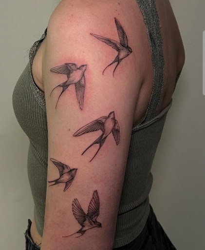 Explore ear tattoo ideas for females, creative tattoo ideas in Spokane, available at Feel Good Ink