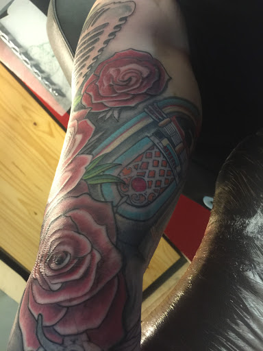 Explore initial tattoo ideas for guys, creative tattoo ideas in Dover, available at Walls of Wonder Tattoo And Body Piercing