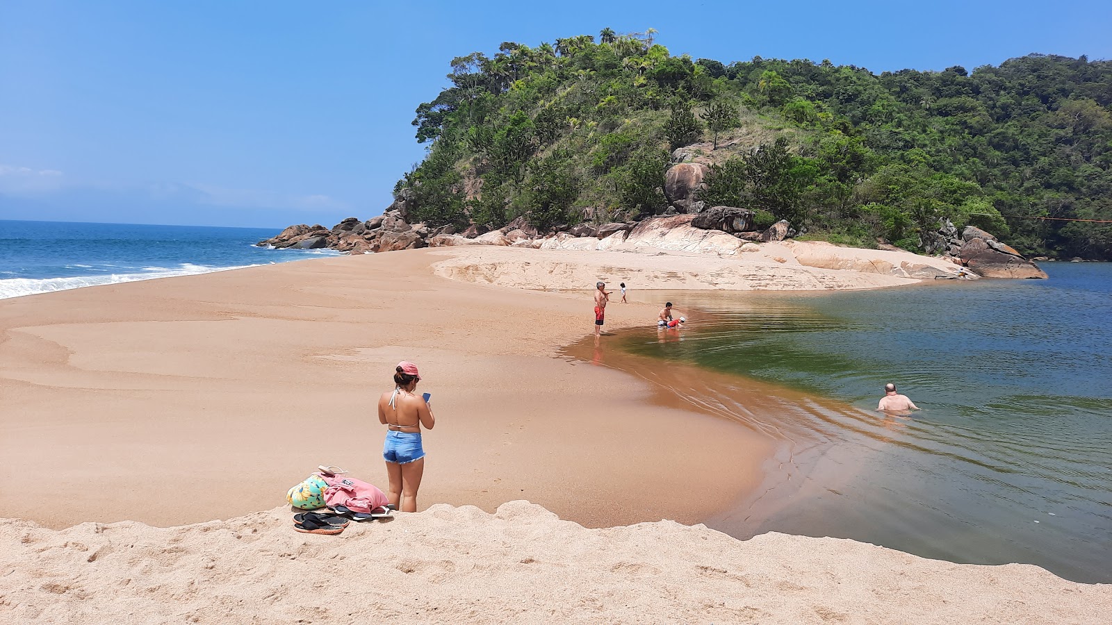 Foto de Praia do Capricornio com areia brilhante superfície