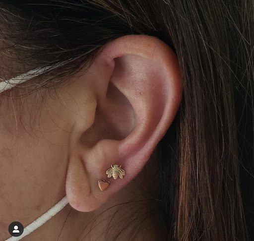 Explore women's spine tattoo ideas, creative tattoo ideas in Edison, available at Black Moon Piercing