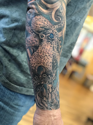 Find tattoos ideas for moms for your next unique tattoo in Peoria at Iron Key Tattoo Studio Inc.