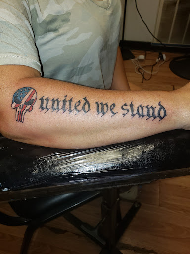 Explore black mens tattoo ideas, creative tattoo ideas in Export, available at Patriotic pain tattoo