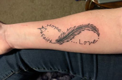 Explore r.i.p tattoo ideas, creative tattoo ideas in Center Line, available at Elite Ink Tattoo Studios