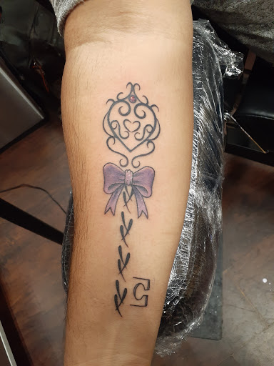 Explore small arrow tattoo ideas, creative tattoo ideas in Orlando, available at Good Vibrations Ink Tattoo and Body Piercing