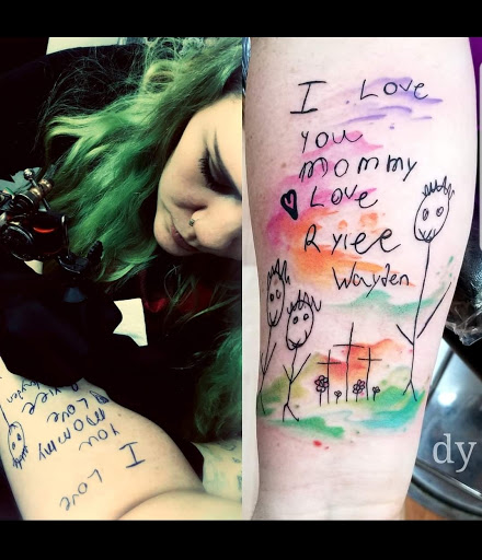 Explore half sleeve tribal tattoo ideas, creative tattoo ideas in Benton, available at Spectrum Tattoo