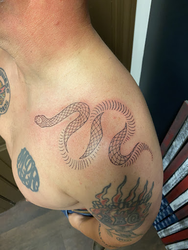 Explore cover up neck tattoo ideas, creative tattoo ideas in Raleigh, available at Tattoos by Anton