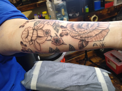 Explore piglet tattoo ideas, creative tattoo ideas in Chester, available at Anchored Arms Custom Tattoo