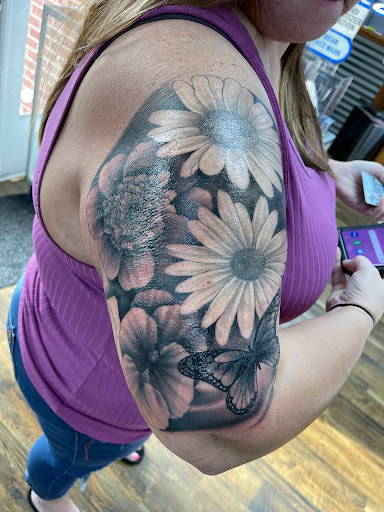 Explore meaningful sister tattoo ideas, creative tattoo ideas in Huntington, available at Golden Dagger Tattoos and Piercings