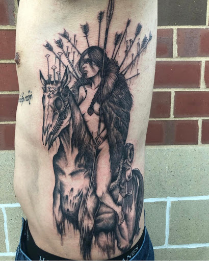 Find western cowboy tattoo ideas for your next unique tattoo in Lakeville at SharkTooth Tattoo & Gallery