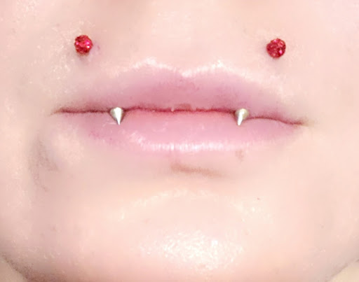 Explore sticker sleeve tattoo ideas, creative tattoo ideas in Redding, available at Dominant Ink