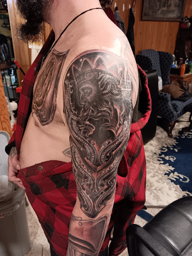 Explore rip tattoos ideas, creative tattoo ideas in Angola, available at SafeHouse Ink