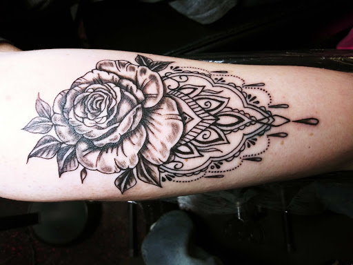 Explore frozen tattoo ideas, creative tattoo ideas in Daytona Beach, available at Studio 21 Tattoo & Piercings Daytona Beach