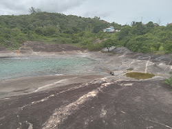 Prainha do Morro do Cruzeiro'in fotoğrafı kısa, düz kıyı şeridi ile birlikte