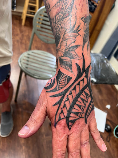 Explore kayak tattoo ideas, creative tattoo ideas in Kihei, available at Paradise Tattoo