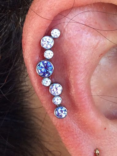 Explore hen tattoo ideas, creative tattoo ideas in El Paso, available at Fox Labyrinth Body Piercing and Fine Jewelry