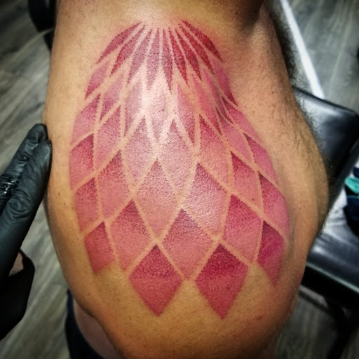 Explore astarion tattoo ideas, creative tattoo ideas in Miami Beach, available at Salvation Tattoo Lounge