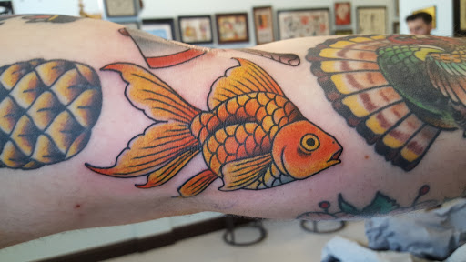 Explore ideas for thigh tattoos, creative tattoo ideas in Providence, available at The Torchbearer Tattoo
