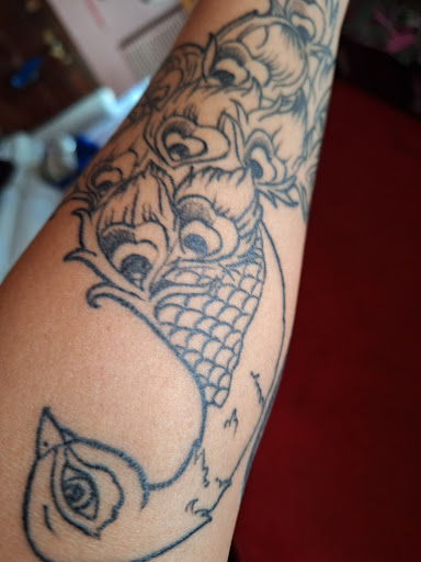 Find ideas for men tattoos for your next unique tattoo in Washington at Moore-Stone Ink