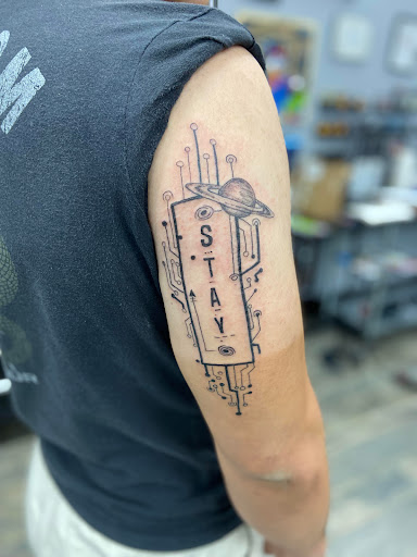 Explore chest tattoo men idea, creative tattoo ideas in El Paso, available at American Tattoo Society of Ft Bliss