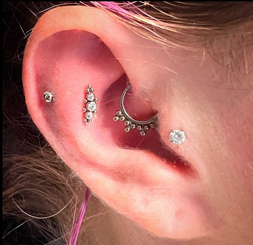 Explore archery tattoo ideas, creative tattoo ideas in Bay Shore, available at Piercings By Dean 95