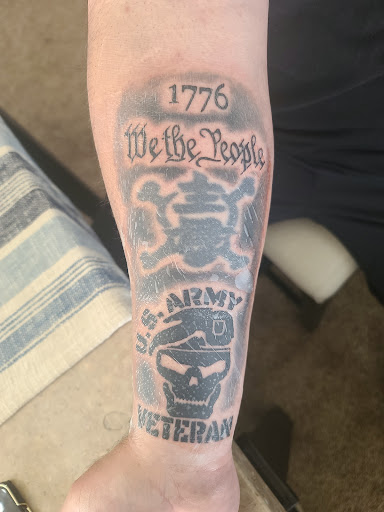 Explore peaky blinders tattoo ideas, creative tattoo ideas in Osage Beach, available at Lake Ozark Tattoo and Hair Studio