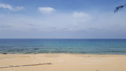 Foto von Rantau Abang Beach und die siedlung