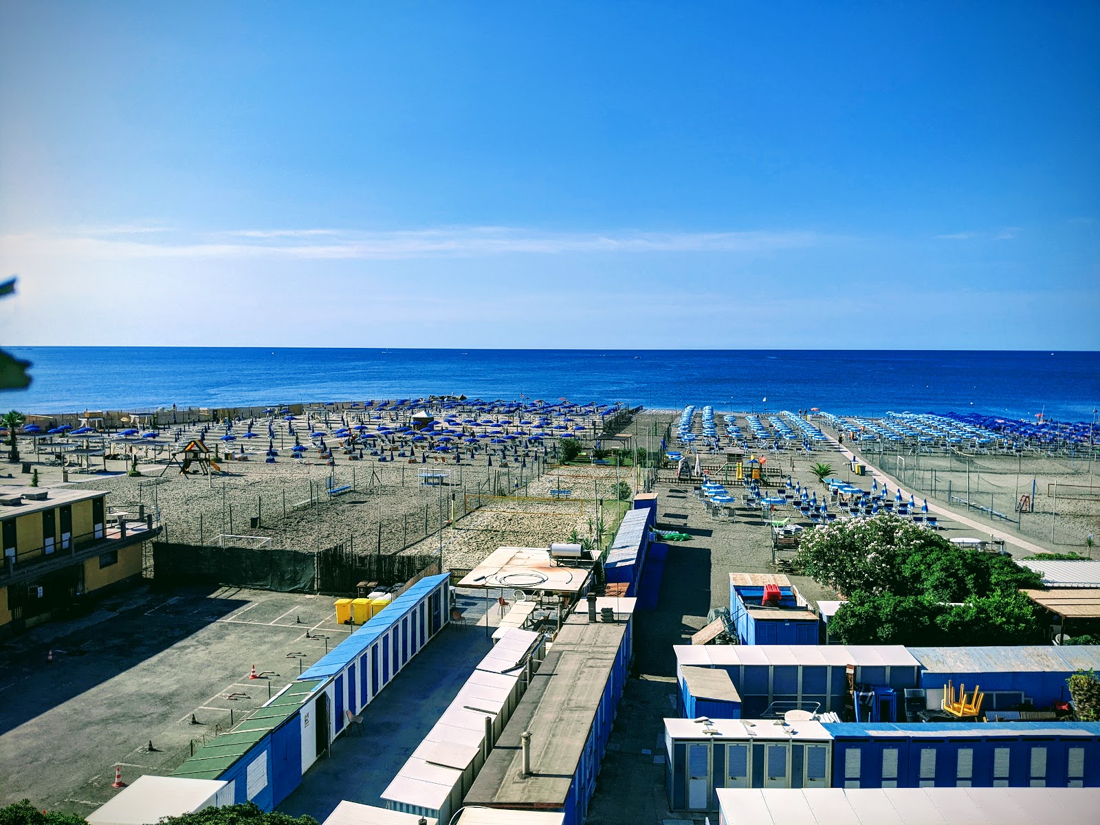 Foto van Spiaggia Tito Groppo met blauw water oppervlakte