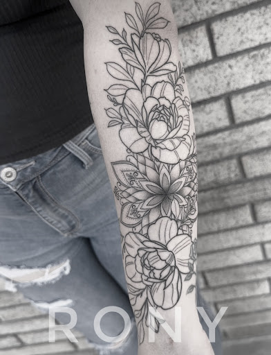Explore carnation tattoo ideas, creative tattoo ideas in Downey, available at Dotta Ink Tattoo & Piercing Parlour