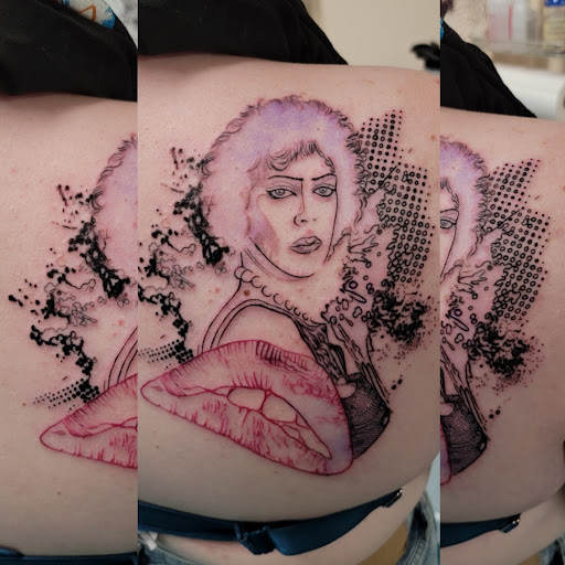 Find tattoo armband ideas for your next unique tattoo in Traverse City at Pinups & Needles