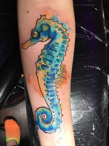 Explore clock tattoo idea, creative tattoo ideas in Rockland, available at Birds & Bones Tattoo Studio and Art Gallery