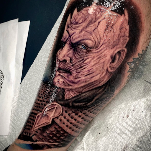 Explore rock climbing tattoo ideas, creative tattoo ideas in Goose Creek, available at Red Kirin Tattoo