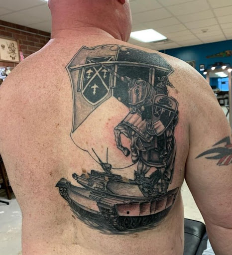 Explore tattoo cover up ideas on ankle, creative tattoo ideas in East Aurora, available at Average Joes Tattoo Shop