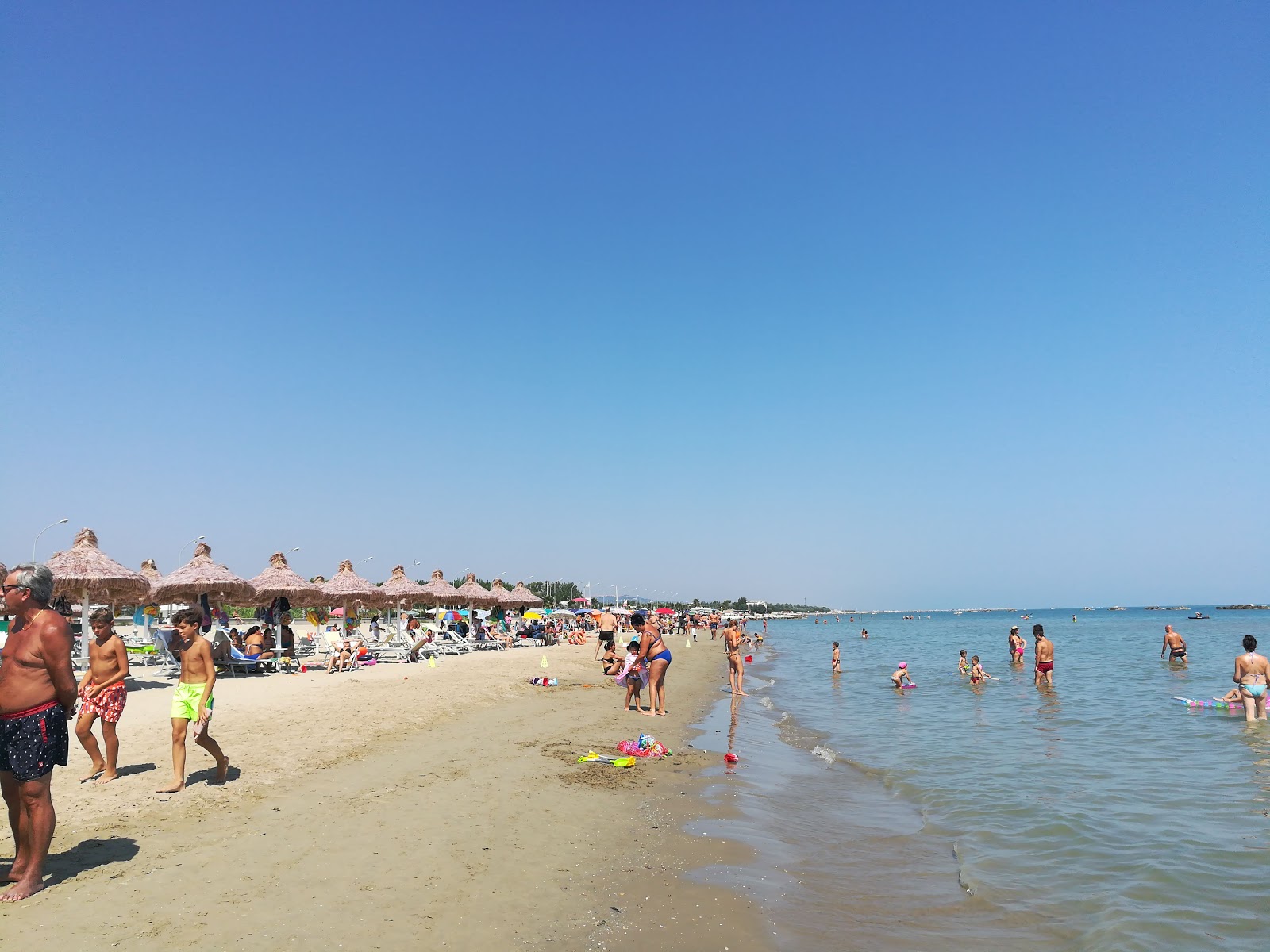 Foto di Spiaggia di Cologna con una superficie del sabbia beige fine