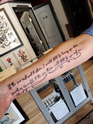 Find tattoo ideas roses for your next unique tattoo in West Lafayette at Revolution Tattoo & Body Modification