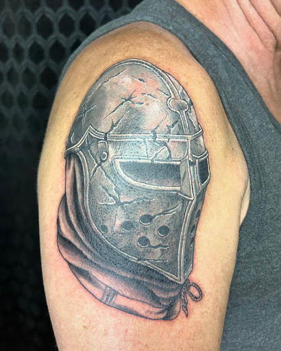 Explore lily tattoo ideas, creative tattoo ideas in Cleveland, available at Vanaheim Tattoo and Piercing Studio