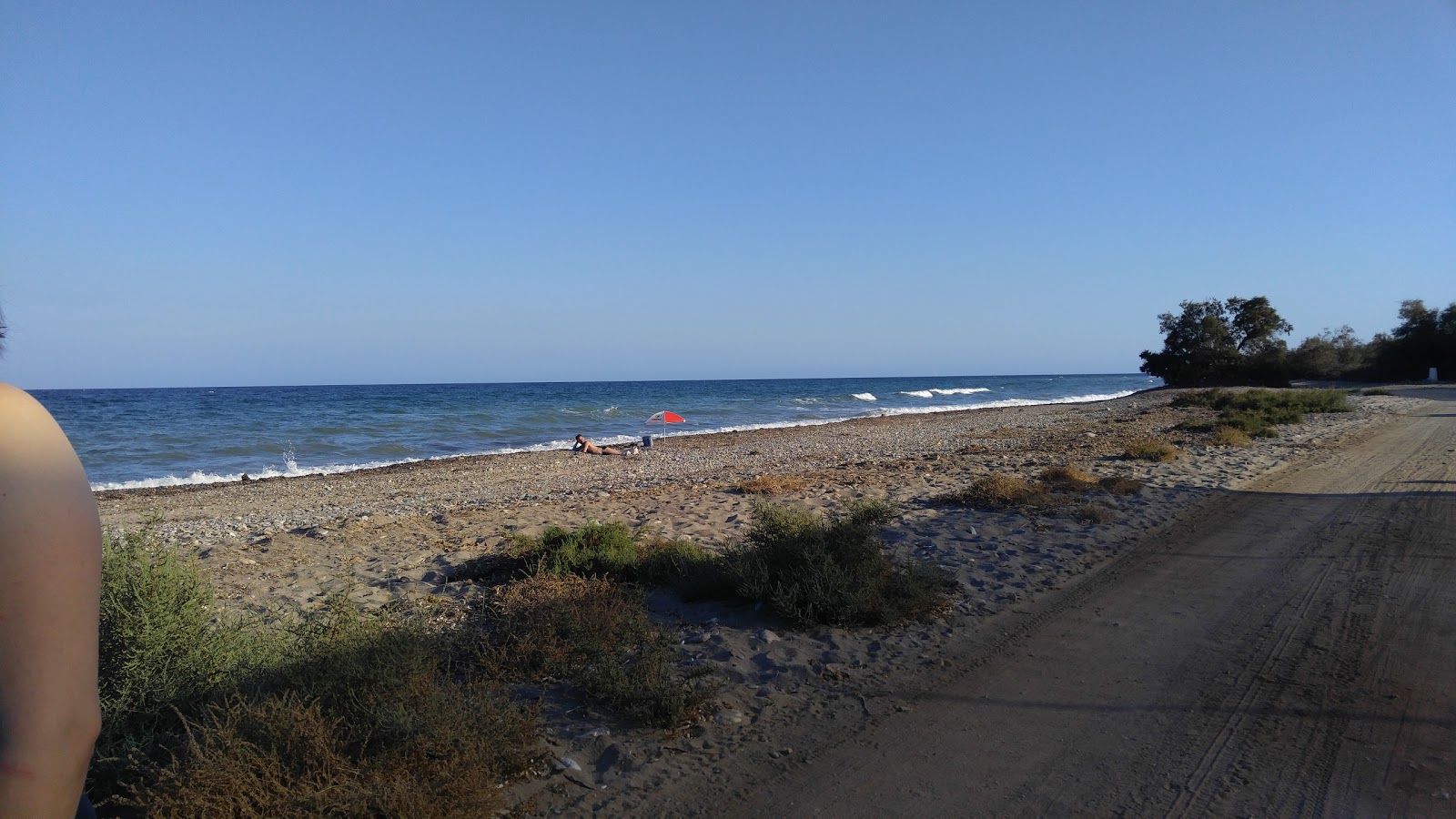 Foto de Playa de las Covaticas con agua turquesa superficie