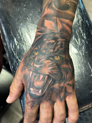 Explore queen of hearts tattoo ideas, creative tattoo ideas in Port Saint Lucie, available at Nevermore Tattoo studio