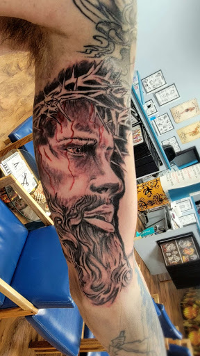 Explore hair tattoo ideas, creative tattoo ideas in Lafayette, available at DragonsBane Tattoo & Body Piercing