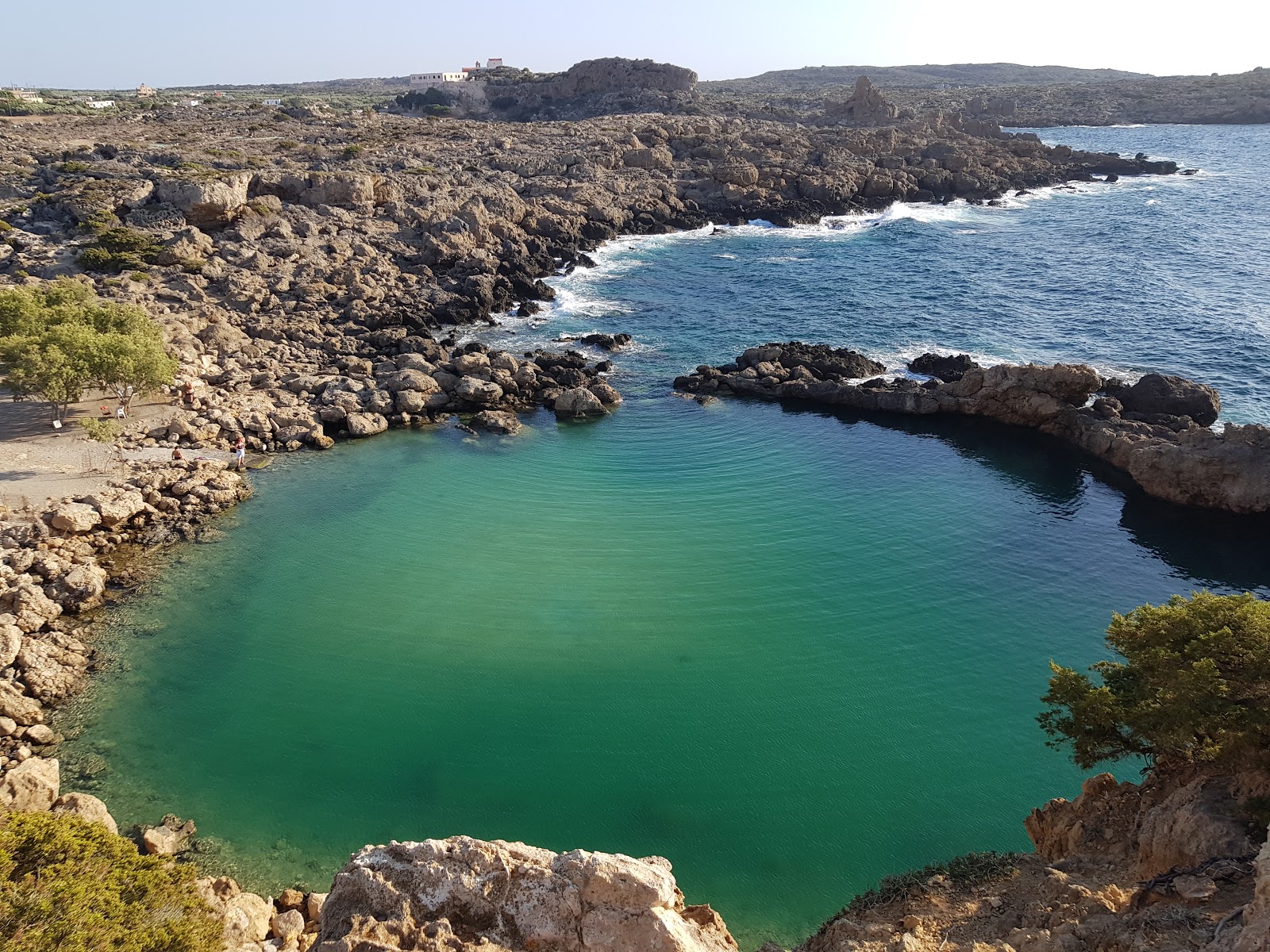 Photo of Voulolimni with rocks cover surface