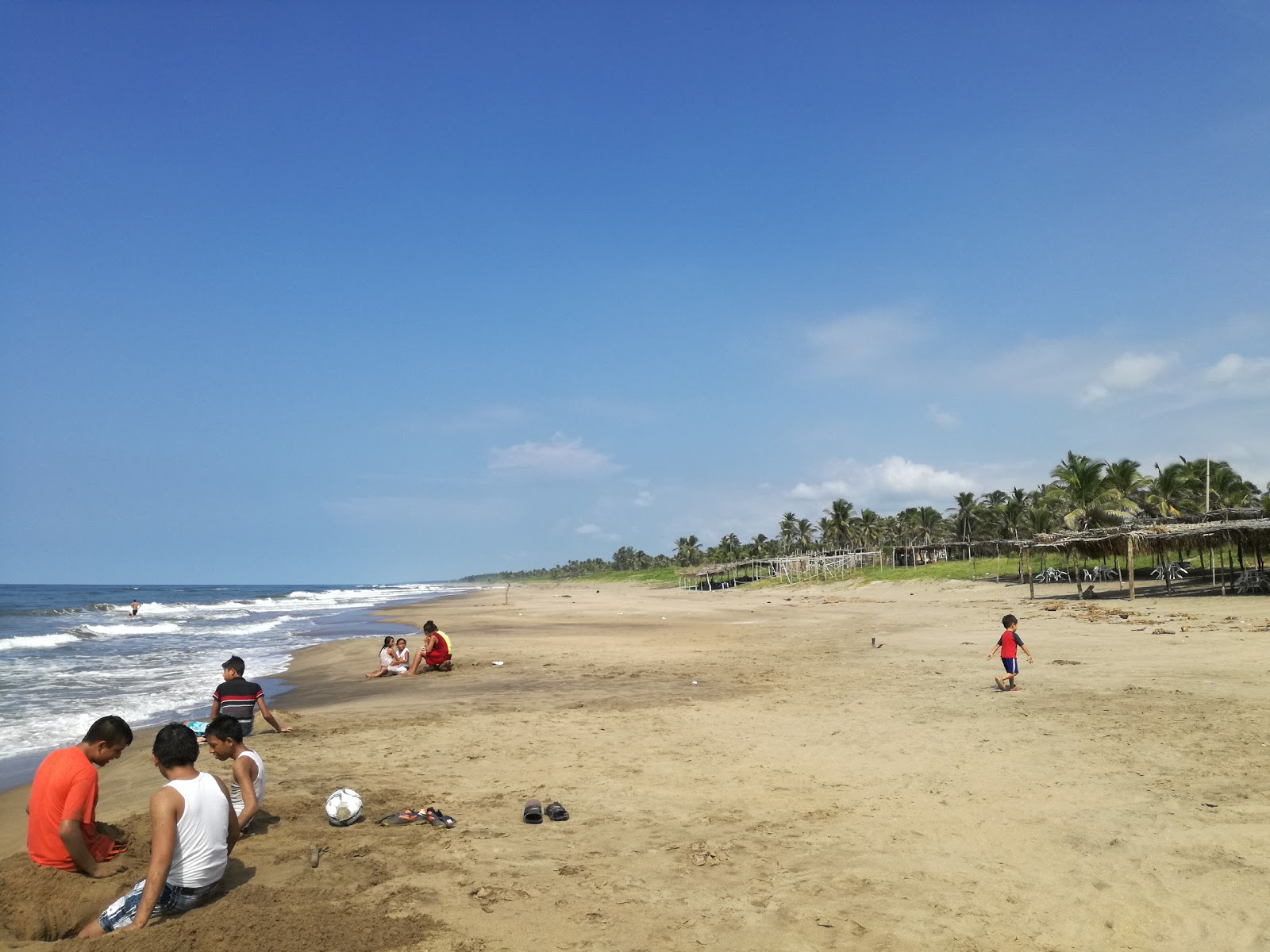 Foto von Playa Las Palmitas mit langer gerader strand