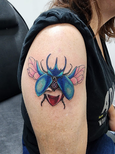 Explore tattoo ideas for a mother who passed away, creative tattoo ideas in Wisconsin Dells, available at Twisted Dimensions Tattoo Studio