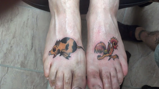 Explore koi sleeve tattoo ideas, creative tattoo ideas in Madison, available at Steves Tattoo & Body Piercing