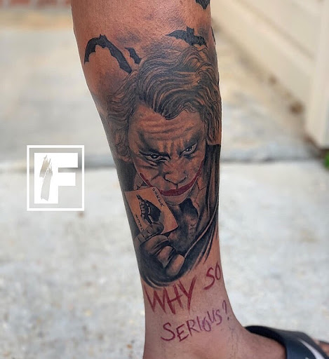 Explore name on neck tattoo ideas, creative tattoo ideas in Hammond, available at Famous Ink, Inc.