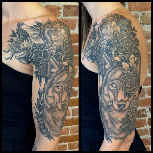 Explore tattoo thigh ideas, creative tattoo ideas in Buffalo, available at The Tilted Rose Tattoo