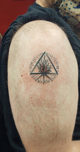 Explore american sleeve tattoo ideas, creative tattoo ideas in Powell, available at Against All Odds Tattoos and Piercings