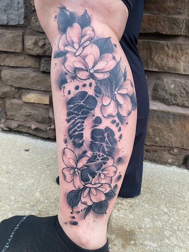 Explore mens back tattoo ideas, creative tattoo ideas in Sullivan, available at Double Time Tattoo